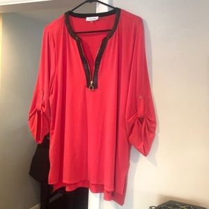 Pink and black leather blouse with gold zipper.